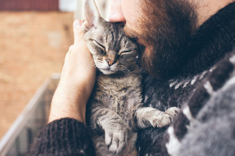 man-hugging-cat